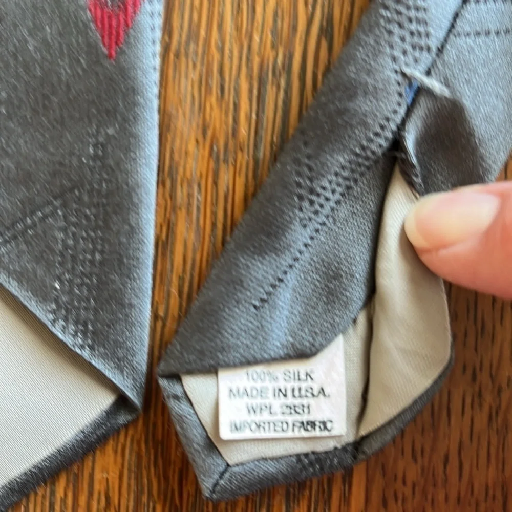 Bon Jour 100% Silk Tie Gray with Blue and Red Hearts Stitching Detail.